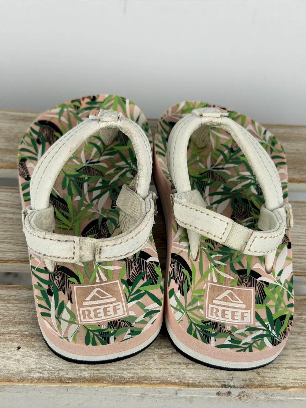 Reef Kids Little Ahi flip flops tropical print on the sole white strap size 6